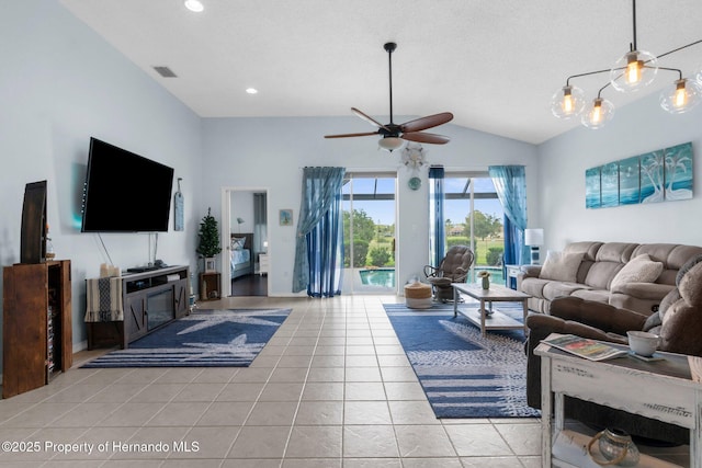 living area featuring light tile patterned flooring, ceiling fan, recessed lighting, lofted ceiling, and visible vents