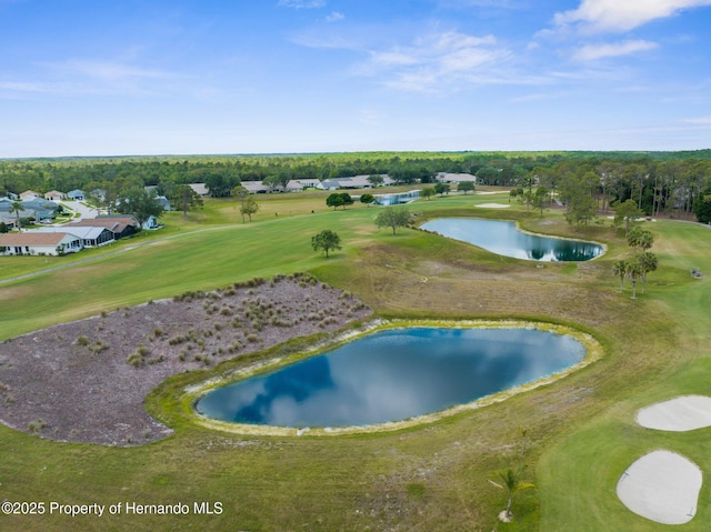 aerial view featuring a water view and golf course view