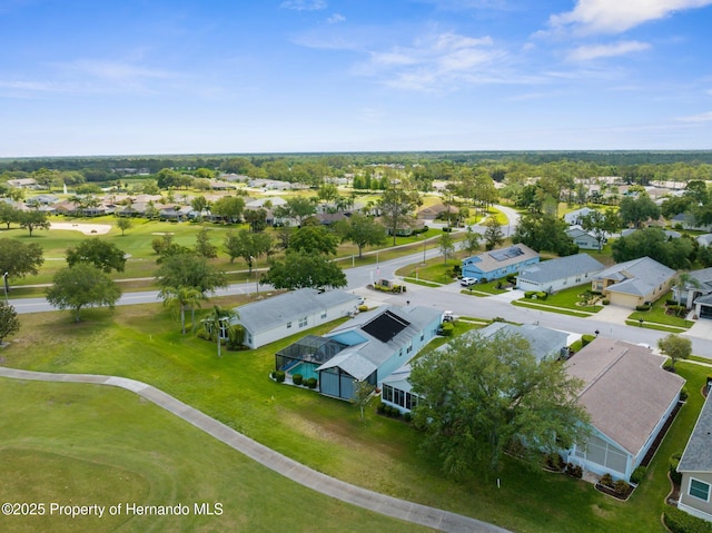 bird's eye view featuring golf course view and a residential view