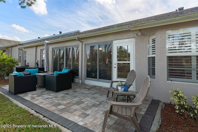 7423 Woodhollow Rd, Spring Hill, FL 34606 - view of patio / terrace with an outdoor living space