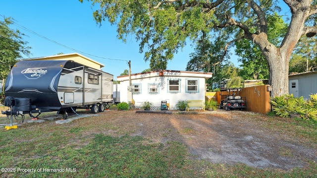 view of front of property with fence