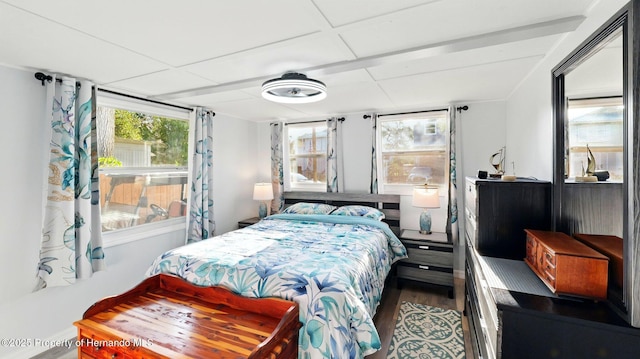 bedroom featuring wood finished floors