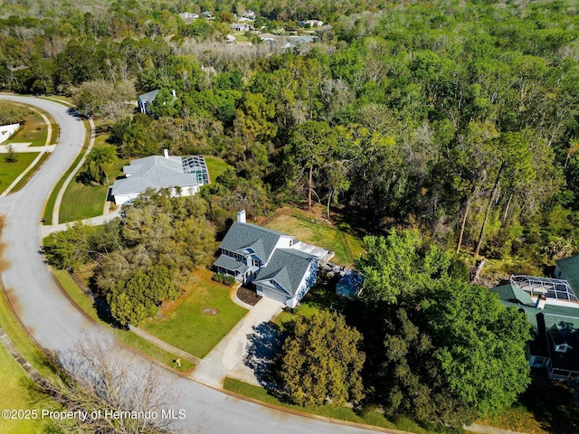 aerial view with a wooded view