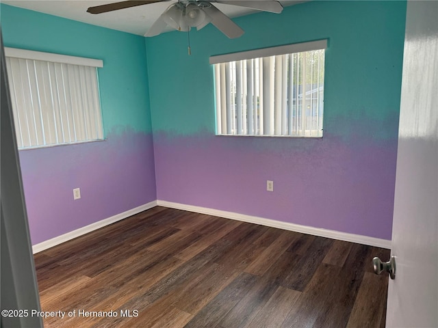 10 Michigan St, Beverly Hills, FL 34465 - empty room with baseboards, a ceiling fan, and wood finished floors