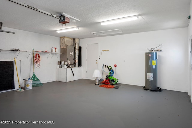 garage featuring heating unit, a garage door opener, and electric water heater