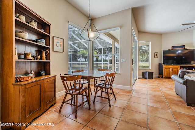 3011 Endsley Rd, Brooksville, FL 34604 - dining room with baseboards, light tile patterned flooring, and a textured wall