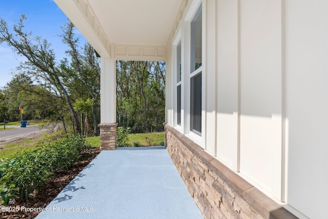 14042 Amero Ln, Spring Hill, FL 34609 - view of patio / terrace with covered porch