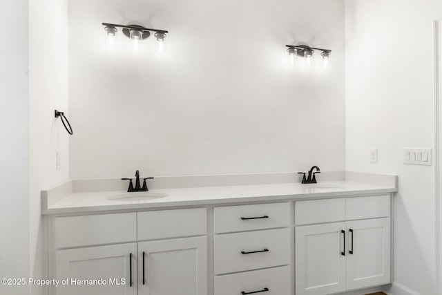 14042 Amero Ln, Spring Hill, FL 34609 - full bath featuring double vanity and a sink