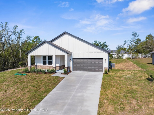 14042 Amero Ln, Spring Hill, FL 34609 - modern farmhouse featuring an attached garage, board and batten siding, driveway, and a front lawn