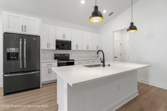14042 Amero Ln, Spring Hill, FL 34609 - kitchen with white cabinetry, black appliances, visible vents, and a sink