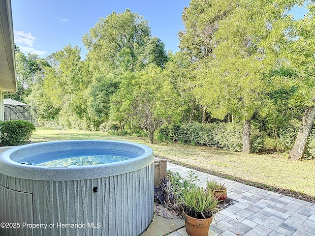 view of swimming pool featuring a patio and central air condition unit