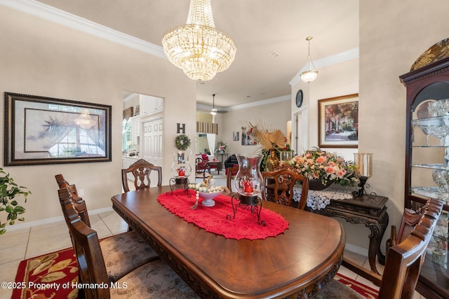 tiled dining room with crown molding, baseboards, and a notable chandelier