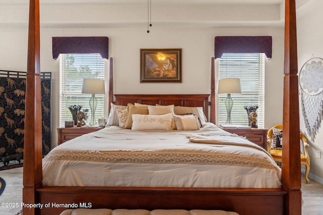 bedroom featuring wood finished floors