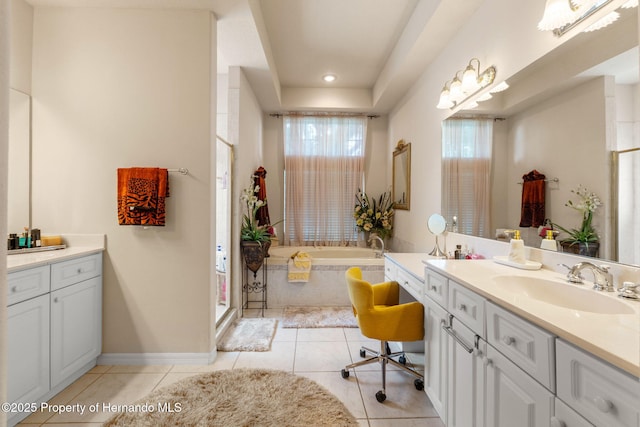 full bath with vanity, tile patterned flooring, walk in shower, and a bath