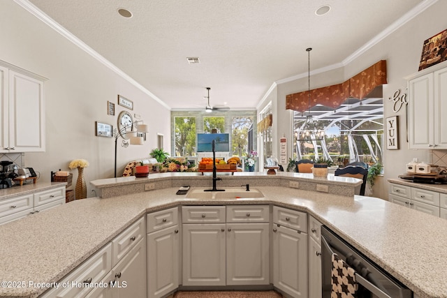 kitchen featuring backsplash, a ceiling fan, visible vents, crown molding, and white cabinetry