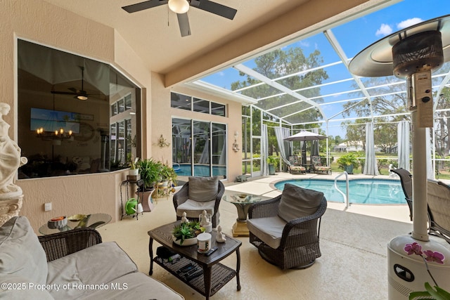 pool featuring an outdoor hangout area, a ceiling fan, and a patio area