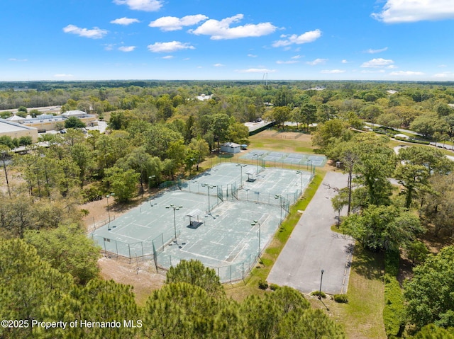 drone / aerial view with a view of trees
