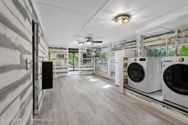 6373 E River Rd, Hernando, FL 34442 - washroom featuring laundry area, ceiling fan, washing machine and dryer, and wood finished floors