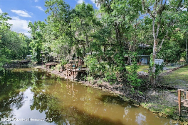 6373 E River Rd, Hernando, FL 34442 - view of dock with a water view and fence