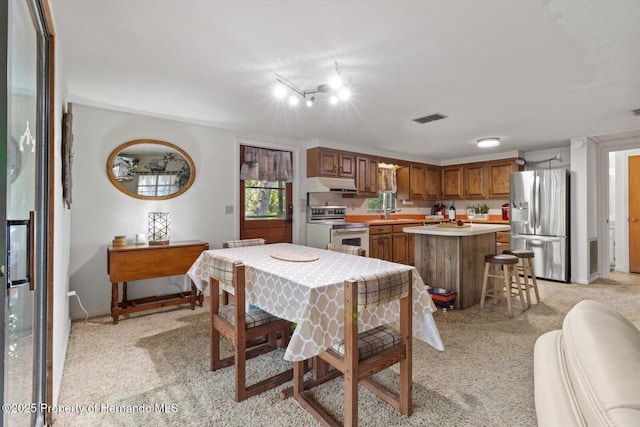6373 E River Rd, Hernando, FL 34442 - dining area with visible vents and light colored carpet
