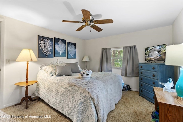 6373 E River Rd, Hernando, FL 34442 - bedroom featuring baseboards, ceiling fan, and carpet