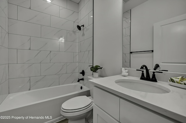 full bathroom with vanity, shower / bathing tub combination, and toilet