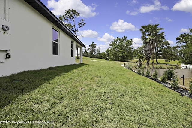 view of yard featuring fence