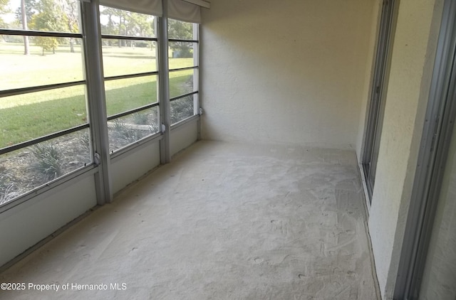 unfurnished sunroom with plenty of natural light