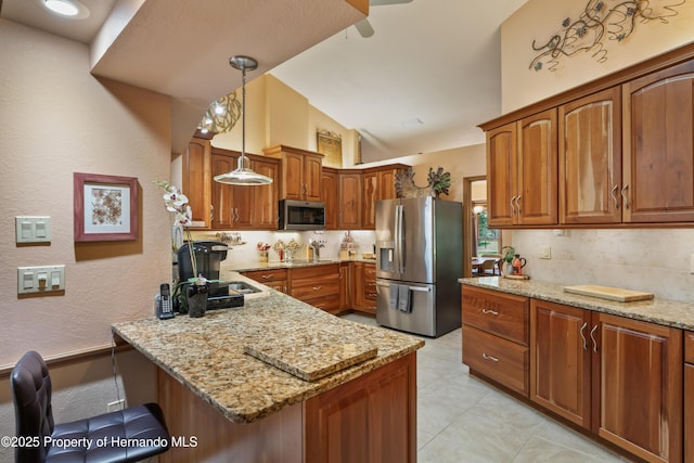 7353 Dogwood, Spring Hill, FL 34607 - kitchen featuring brown cabinets, stainless steel appliances, a peninsula, and tasteful backsplash