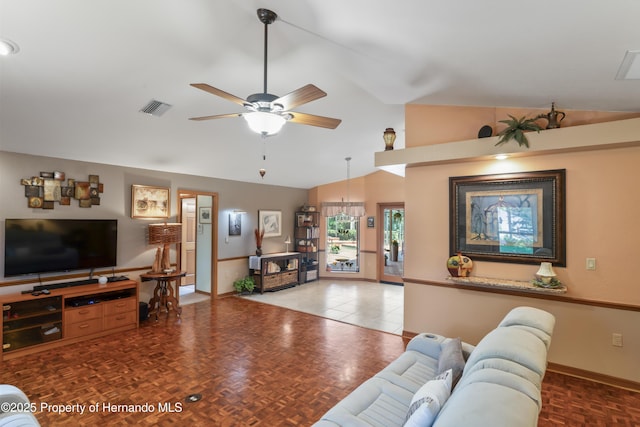 7353 Dogwood, Spring Hill, FL 34607 - living room featuring lofted ceiling, baseboards, visible vents, and a ceiling fan