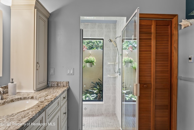 7353 Dogwood, Spring Hill, FL 34607 - full bath with a stall shower, vanity, and a closet