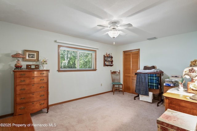 7353 Dogwood, Spring Hill, FL 34607 - interior space featuring light carpet, baseboards, a ceiling fan, and visible vents