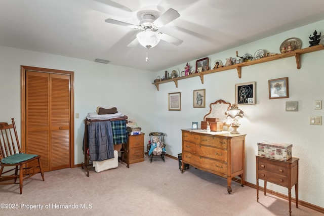 7353 Dogwood, Spring Hill, FL 34607 - bedroom with a ceiling fan, a closet, visible vents, baseboards, and light colored carpet