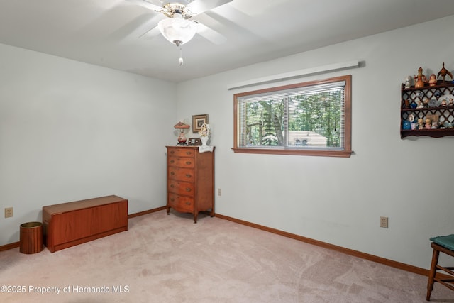 7353 Dogwood, Spring Hill, FL 34607 - bedroom featuring light colored carpet, baseboards, and ceiling fan