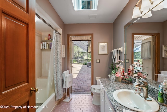 7353 Dogwood, Spring Hill, FL 34607 - bathroom with shower / bath combination with curtain, toilet, tile patterned flooring, and vanity