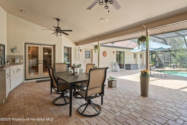 7353 Dogwood, Spring Hill, FL 34607 - view of patio with glass enclosure, french doors, a ceiling fan, and an outdoor pool