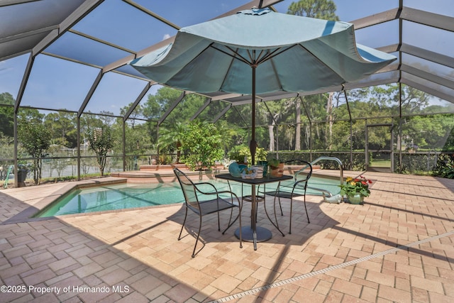 7353 Dogwood, Spring Hill, FL 34607 - outdoor pool featuring a lanai and a patio