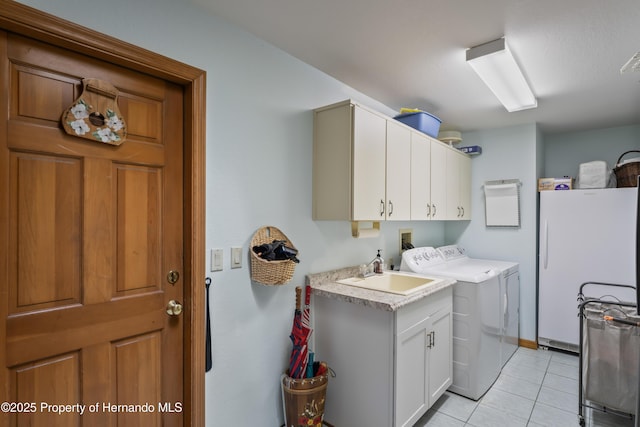 7353 Dogwood, Spring Hill, FL 34607 - laundry room featuring light tile patterned floors, washing machine and dryer, a sink, and cabinet space