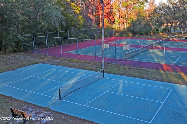 7353 Dogwood, Spring Hill, FL 34607 - view of sport court featuring fence