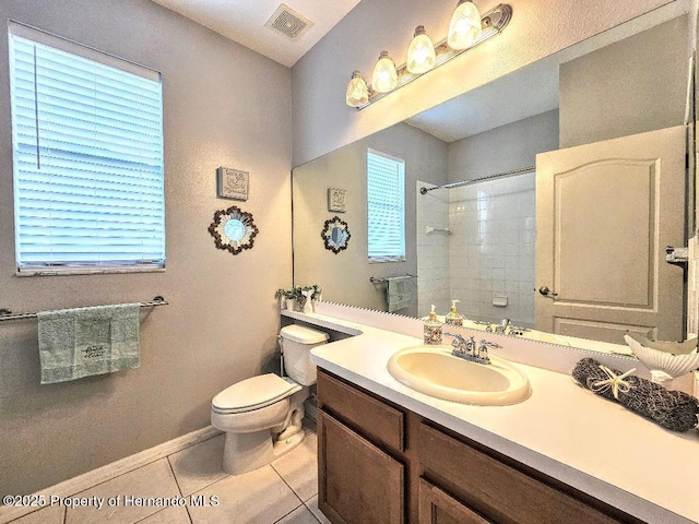 4214 Canongate Ct, Spring Hill, FL 34609 - full bath with vanity, tiled shower, and tile patterned floors