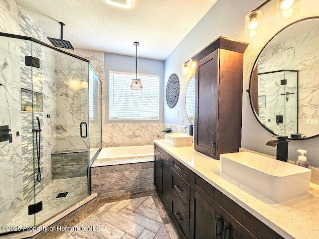 4214 Canongate Ct, Spring Hill, FL 34609 - full bath featuring a bath, double vanity, a marble finish shower, and a textured ceiling