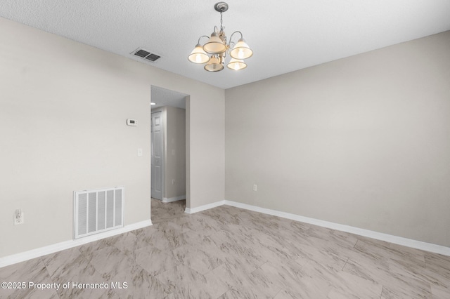 6440 Curtiss Ln, Spring Hill, FL 34608 - empty room with a chandelier and baseboards