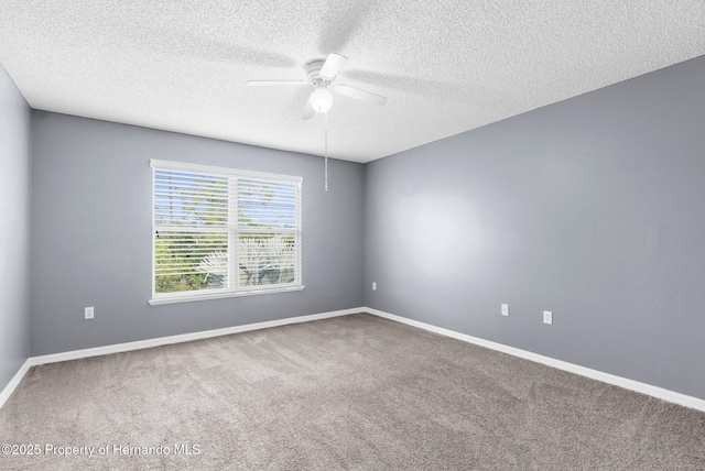 6440 Curtiss Ln, Spring Hill, FL 34608 - unfurnished room featuring a ceiling fan, carpet, baseboards, and a textured ceiling