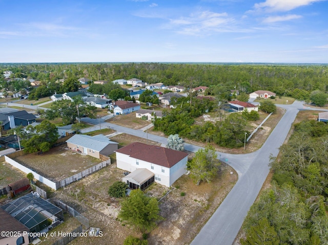 6440 Curtiss Ln, Spring Hill, FL 34608 - aerial view of residential area with a heavily wooded area