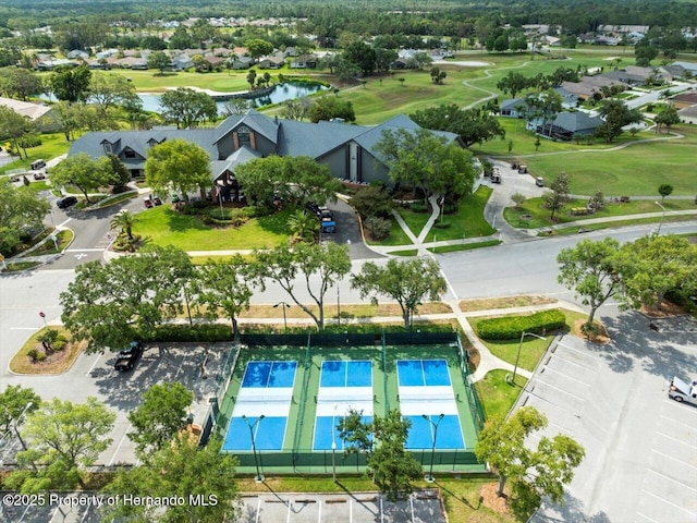 18514 Hidden Pines Way, Hudson, FL 34667 - aerial view of residential area featuring a nearby body of water and a golf club