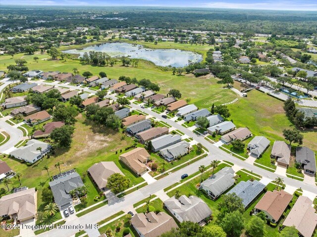18514 Hidden Pines Way, Hudson, FL 34667 - aerial view of property's location with a large body of water and nearby suburban area
