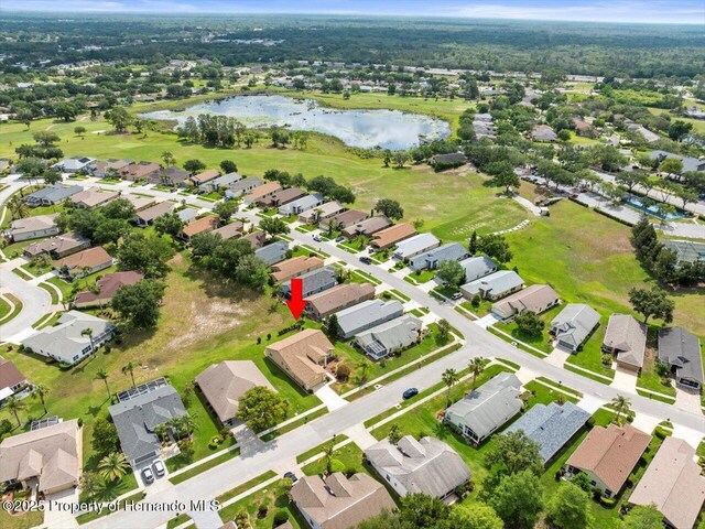 18514 Hidden Pines Way, Hudson, FL 34667 - aerial overview of property's location featuring a large body of water and nearby suburban area