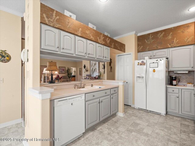 18514 Hidden Pines Way, Hudson, FL 34667 - kitchen featuring white appliances, a sink, gray cabinetry, light countertops, and ornamental molding