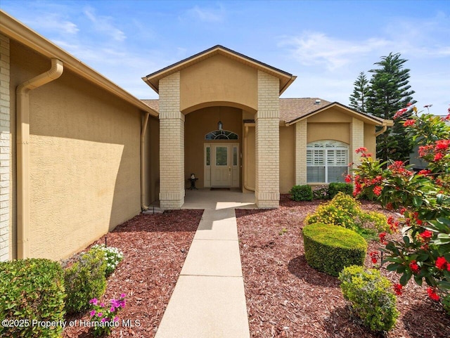 18514 Hidden Pines Way, Hudson, FL 34667 - entrance to property with stucco siding