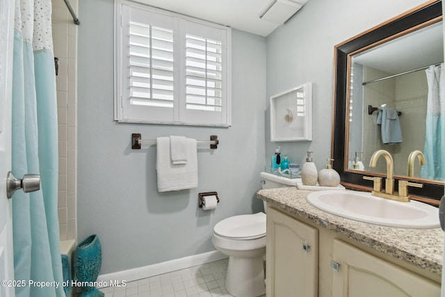 4008 Passport Ln, New Port Richey, FL 34653 - full bath featuring baseboards, toilet, vanity, and tile patterned floors